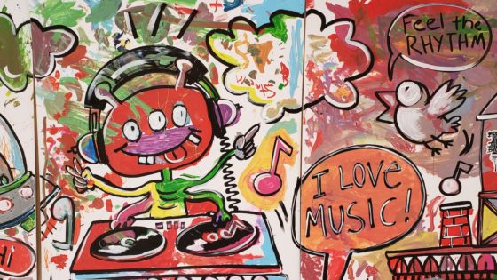 alien making music on a mural