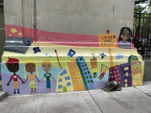 Image of mural with the school's new name displayed